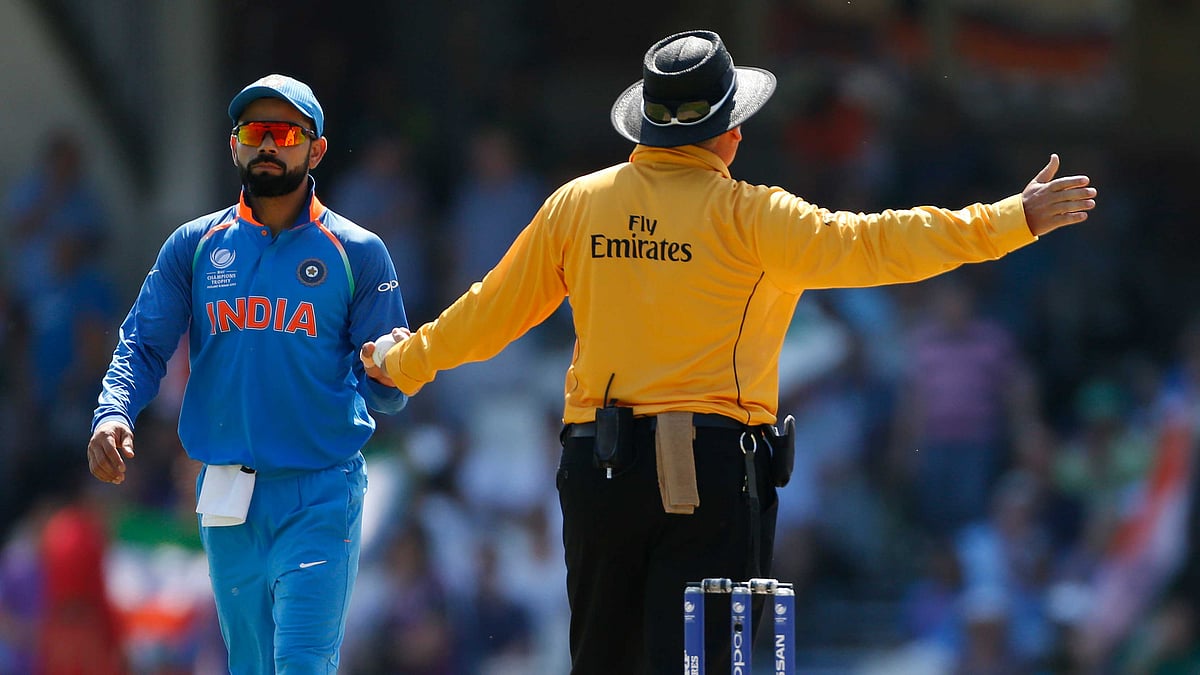 India’s Virat Kohli reacts after a no ball was called after Jasprit Bumrah took the wicket of Pakistan’s Fakhar Zaman. (Photo: Reuters)