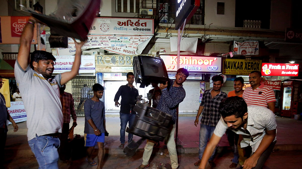 Cricket fans break television sets after India lost the Champions Trophy final against Pakistan in London on Sunday. (Photo: PTI)