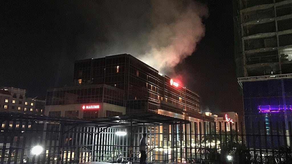 Smoke rises from the Resorts World Manila complex. (Photo: AP)