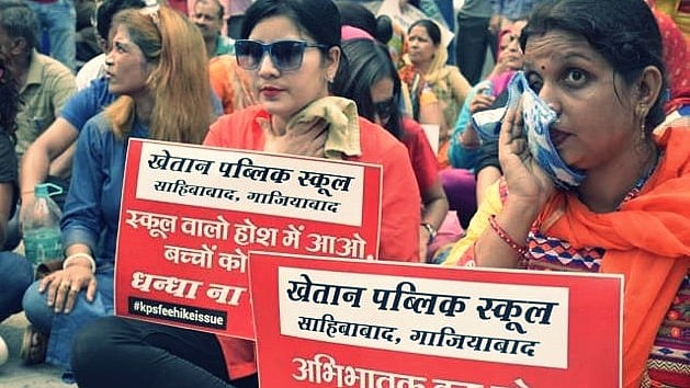 Parents protesting against school fee hike in Ghaziabad.&nbsp;