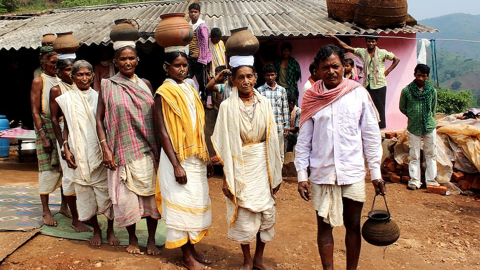 Led by village headman Krusna Kadraka and Dasara Kadraka in an earlier mission to collect lost millet varieties, the women of Kadarguma prepare to walk to their clan families in remote hamlets. 