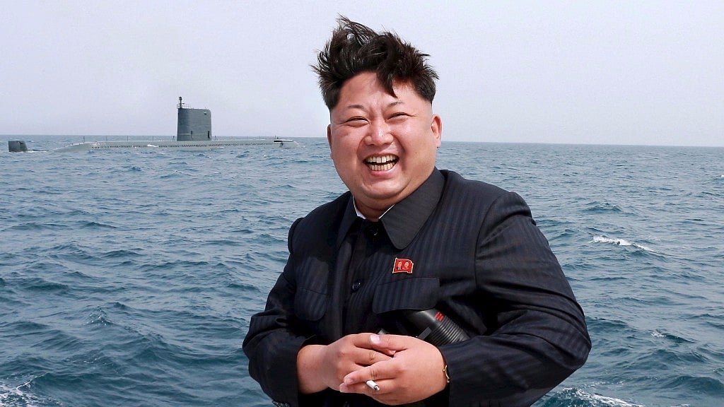 North Korean leader Kim Jong-un watches the test-fire of a strategic submarine underwater ballistic missile (not pictured), in this undated photo released by North Korea’s Korean Central News Agency (KCNA) in Pyongyang on 9 May 2015. 