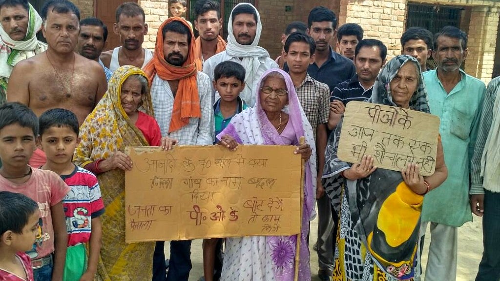Villagers have put up banners stating the name will stay until their demands are met. (Photo:Vivek Mishra)