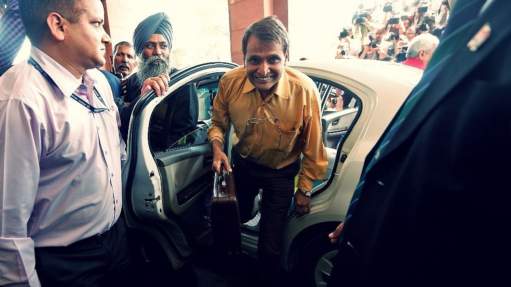 Indian Railway Minister Suresh Prabhu arrives at the parliament to unveil the railway budget in New Delhi 26 February 2015.