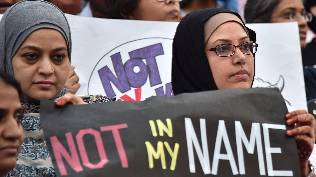 

 People participate in “Not In My Name” protests against the killing of Junaid Khan in Bengaluru on 28 June 2017.