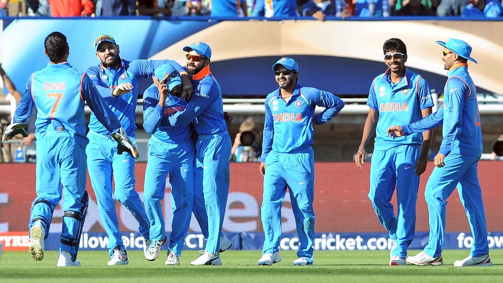 Indian team after the celebrating dismissal of Pakistan’s Shoaib Malik during the ICC Champions Trophy (Photo: AP) 