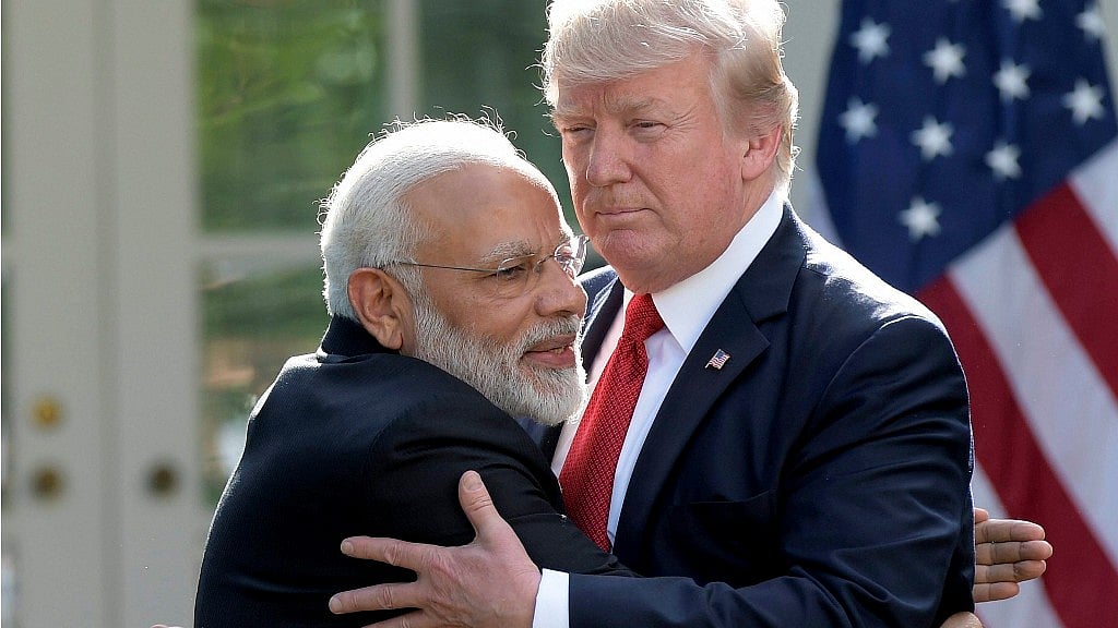 President Donald Trump and Indian Prime Minister Narendra Modi hug during their meeting in the Rose Garden of the White House in Washington on Monday.