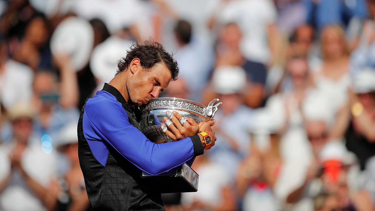 Spain’s Rafael Nadal celebrates winning his tenth French Open title against Switzerland’s Stan Wawrinka in three sets, 6-2, 6-3, 6-1. (Photo: AP)