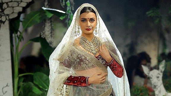 Dia Mirza as the showstopper for Anju Modi’s show at India Couture Week 2017. (Photo: FDCI)&nbsp;