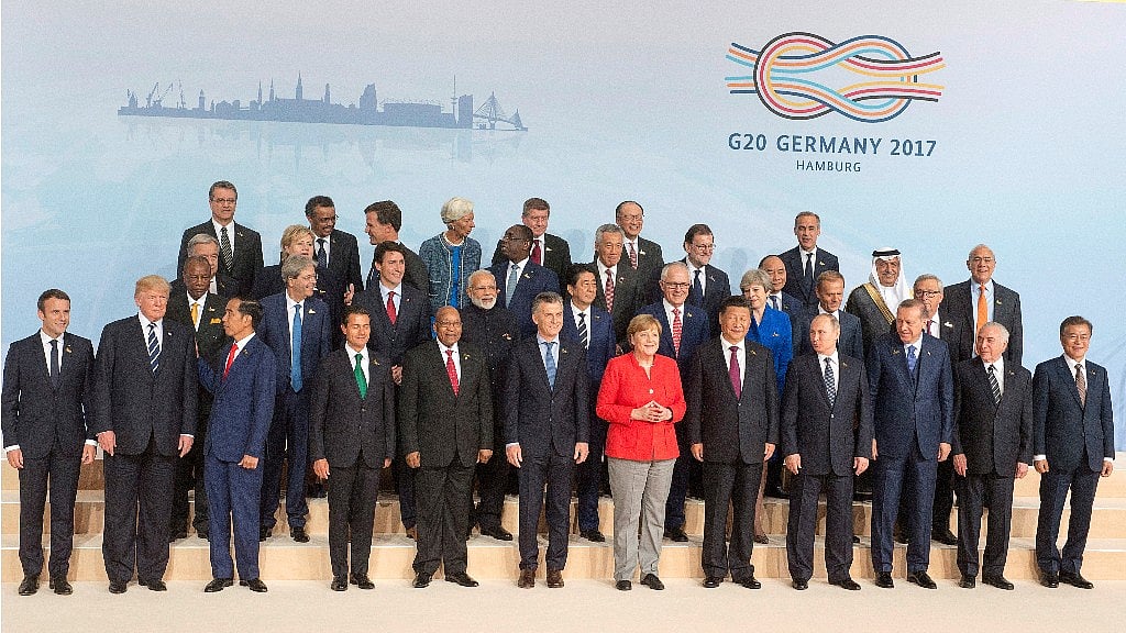Leaders of the G20 nations pose for the traditional family photo at the G20 summit Friday, 7 July 2017 in Hamburg, Germany.