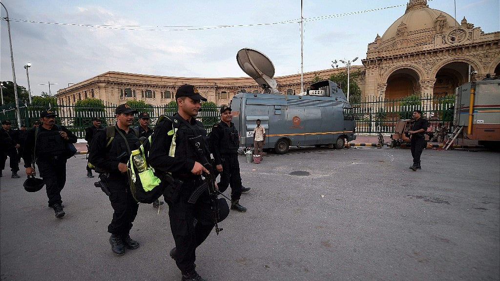 NIA team outside Uttar Pradesh assembly in Lucknow on Friday after PETN explosives were found on the premises.