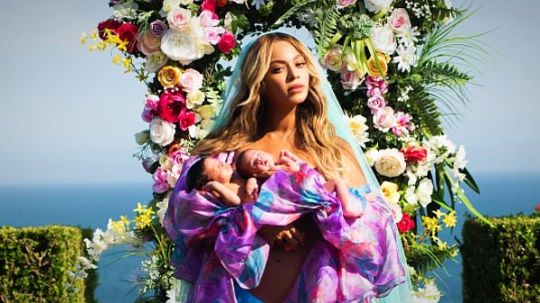 Beyonce with Sir Carter and Rumi. 