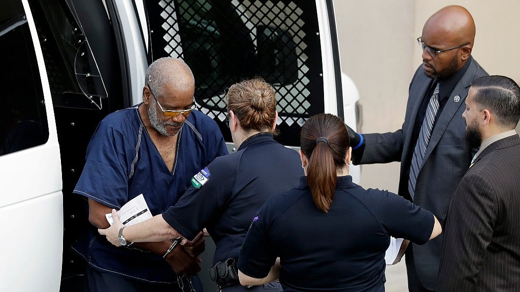 James Mathew Bradley Jr (left) arrives at the federal courthouse for a hearing on Monday.