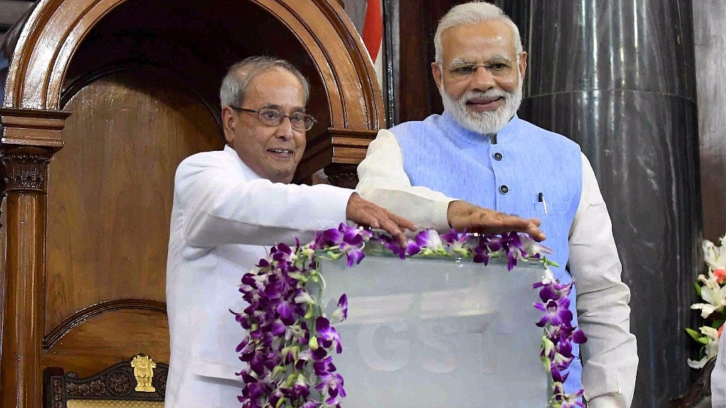 President Pranab Mukherjee and Prime Minister Narendra Modi press buttons for the launch of Goods and Services Tax (GST) at midnight.