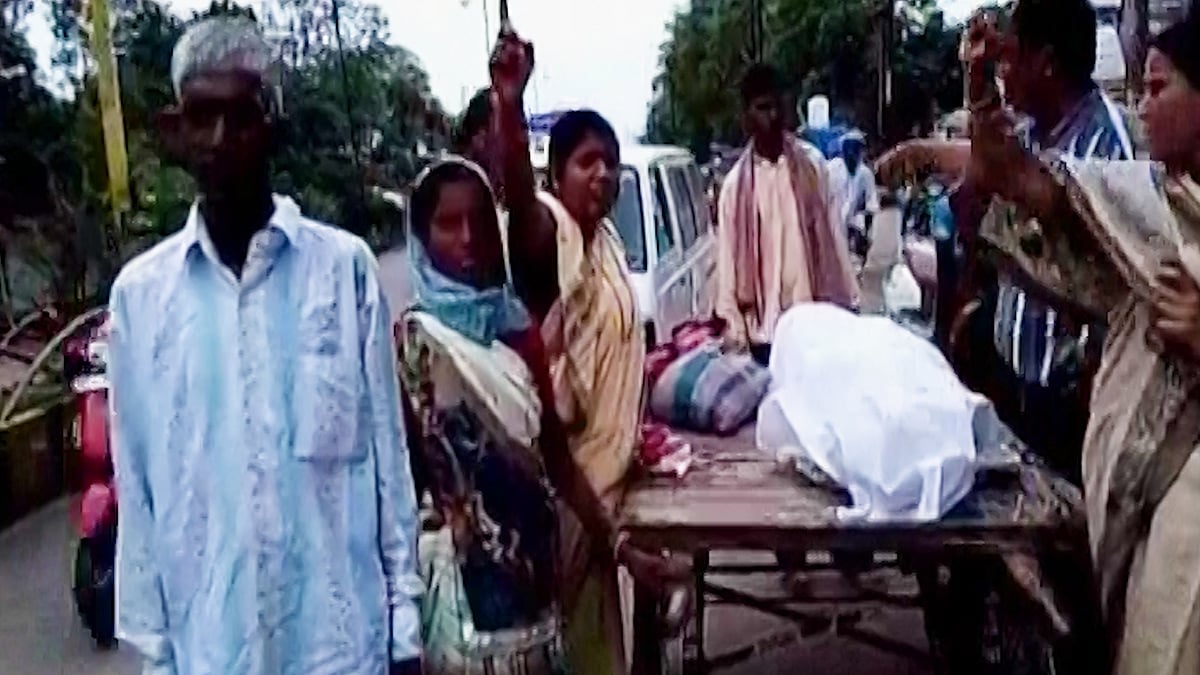 The dead teen was carried home on a hand cart as the hospital could not make a hearse van available.