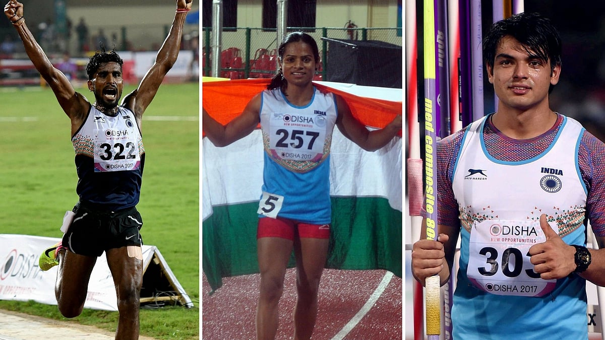 Govinda Lakshmanan (L), Dutee Chand and Neeraj Chopra (R) celebrate their medals at the Asian Athletics Championships.