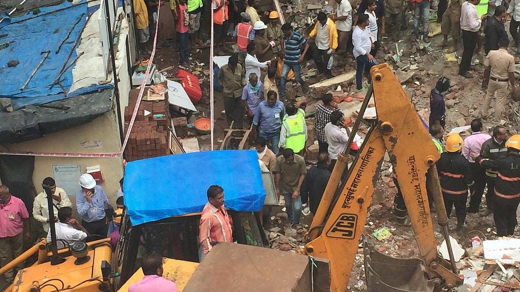 Rescue personnel, including the BMC, NDRF and Mumbai police, at the collapse site.