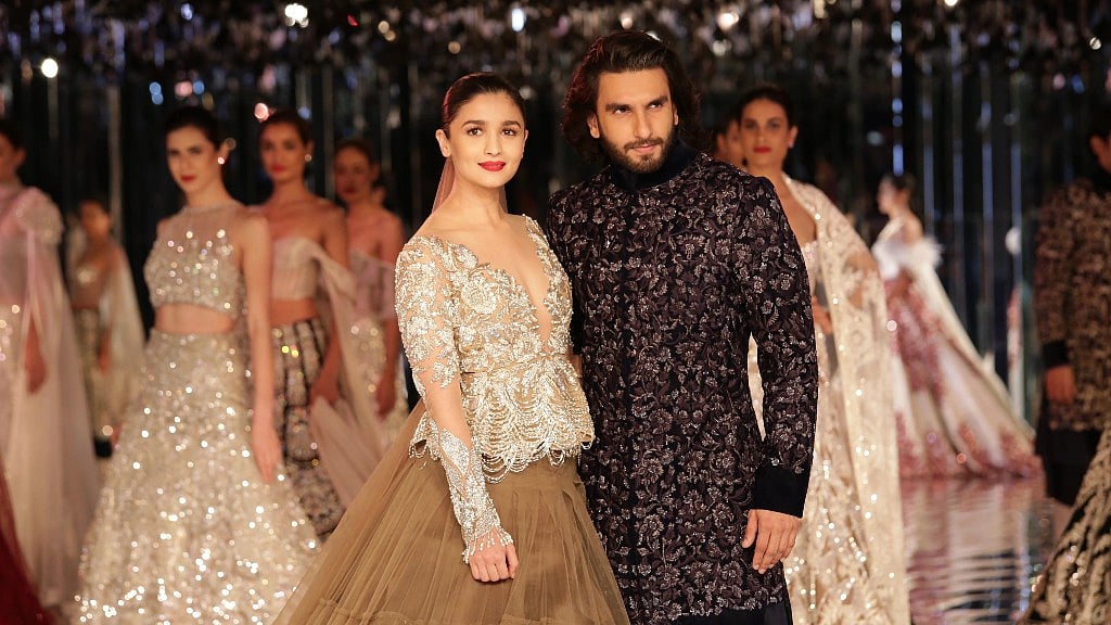 Alia Bhatt with Ranveer Singh on the ramp for Manish Malhotra.