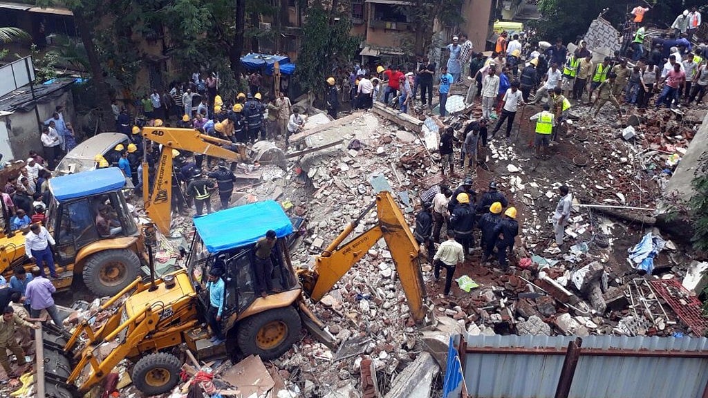 Rescue operations underway at the site where two wings of a four-storey building collapsed