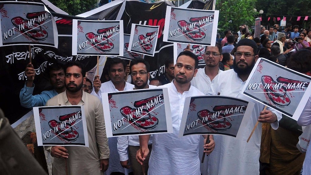 People stage a demonstration during “Not In My Name” protest organised against the killing of Junaid Khan, in Kolkata, 28 June, 2017.