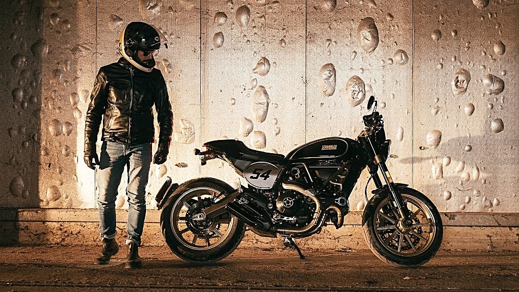 The Ducati Scrambler Cafe Racer with the legendary 54 number sported by racer Bruno Spaggiari in the 1960s.