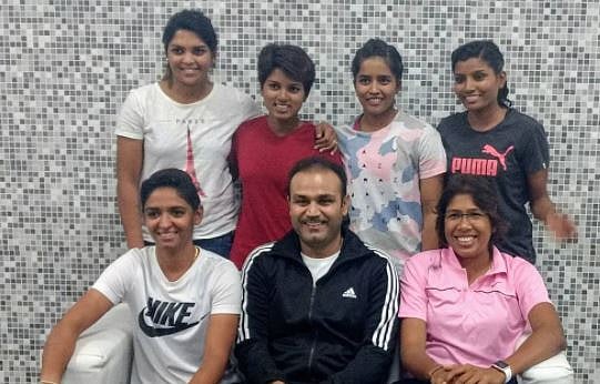 Virender Sehwag with the girls from Indian Cricket team.