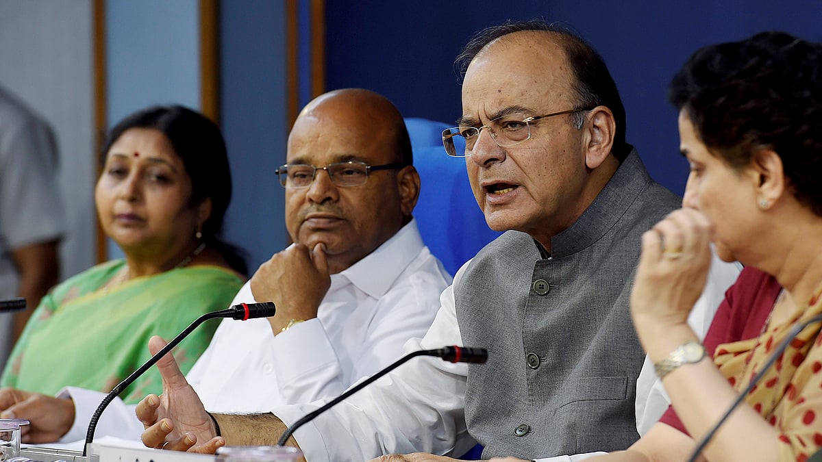 Arun Jaitley with Thawar Chand Gehlot, addressing a press conference after a cabinet meeting in New Delhi 