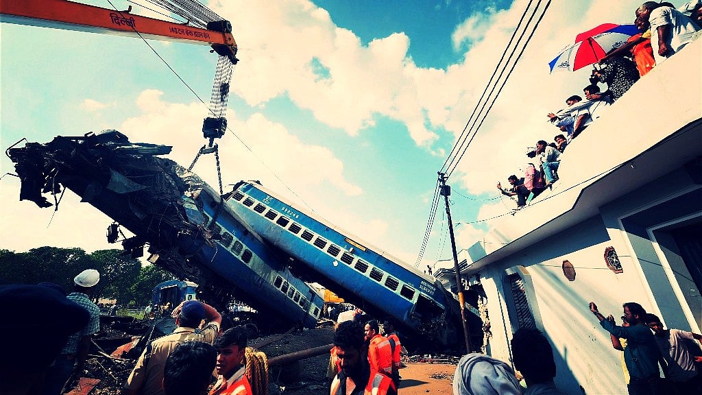 A mangled coach of the Puri-Haridwar Utkal Express train being hauled off the tracks by a crane, at the accident site in Khatauli near Muzaffarnagar. Image used for representational purpose only.&nbsp;