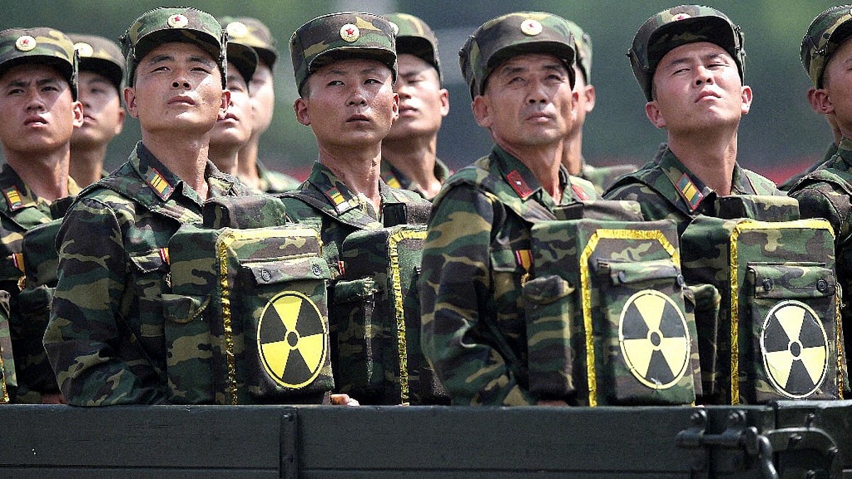 In this July 27 2013 file photo, North Korean soldiers turn and look towards their leader Kim Jong Un during a ceremony marking the 60th anniversary of the Korean War armistice in Pyongyang, North Korea. 