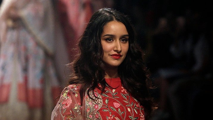 Bolywood actress Shraddha Kapoor displays a creation by Rahul Mishra during the Lakme Fashion Week in Mumbai, India, Friday, Aug. 18, 2017. 
