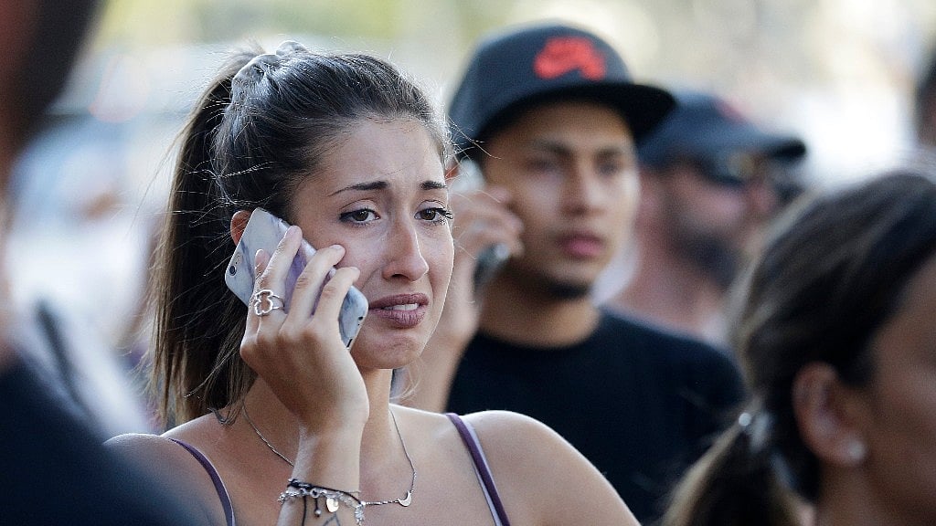 A van mowed through crowds of tourists on Barcelona’s most famous avenue on Thursday, killing at least a dozen people.