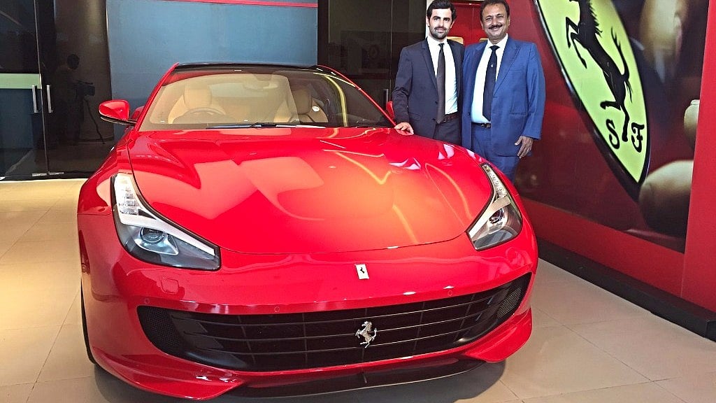 Aurelian Sauvard, Marketing Manager, Ferrari Middle East & India, and Sharad Kachalia of Navnit Motors at the launch of the Ferrari GTC4Lusso in Mumbai.