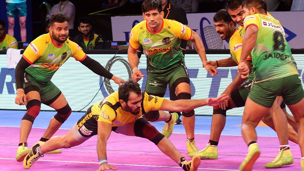Telugu Titans and Patna Pirates in action.
