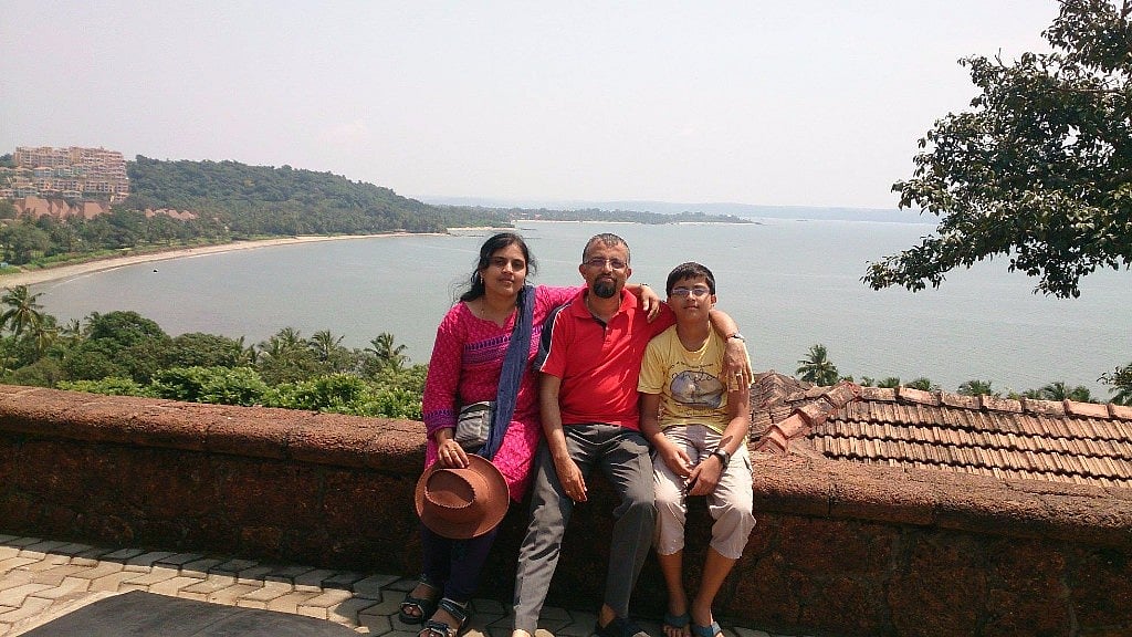 Vivek (centre) with his parents Rashmi and Nagesh