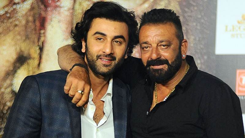 Ranbir Kapoor and Sanjay Dutt at an event.
