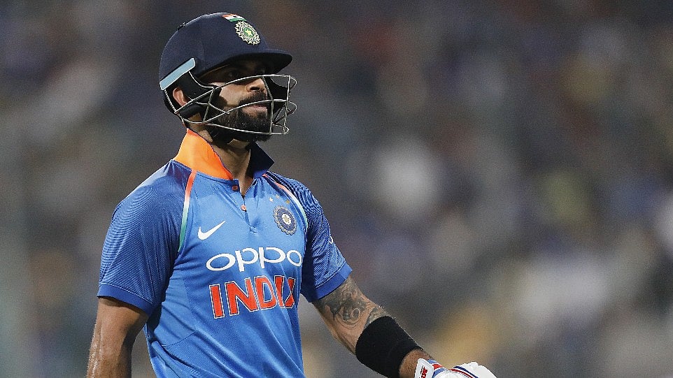 Virat Kohli walks back to the pavilion after getting dismissed in the fourth ODI against Australia.