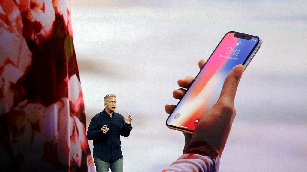 Phill Schiller, VP marketing at Apple, demonstrating Face ID on iPhone X. 
