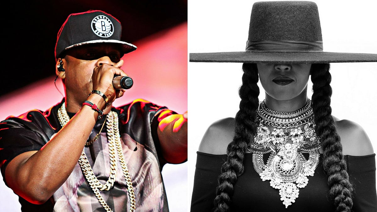 Jay-Z (L); Michelle Obama
