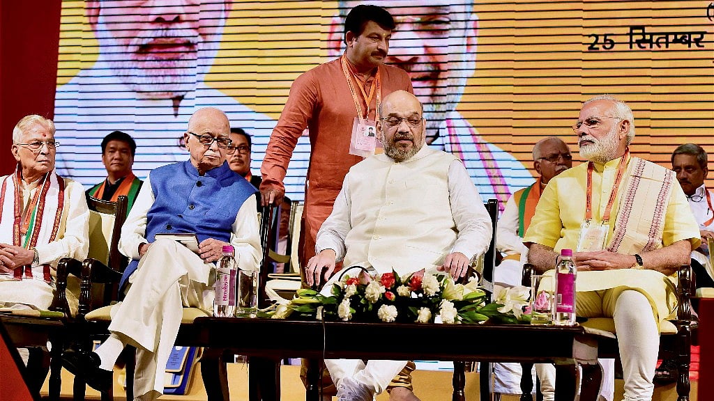 Prime Minister Narendra Modi with BJP President Amit Shah, senior party leaders LK Advani, MM Joshi and Manoj Tewari.