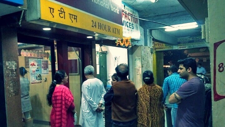 People wait outside ATM kiosks after Prime Minister Narendra Modi announced demonetisation on 8 November 2016. Photo used for representational purpose. 