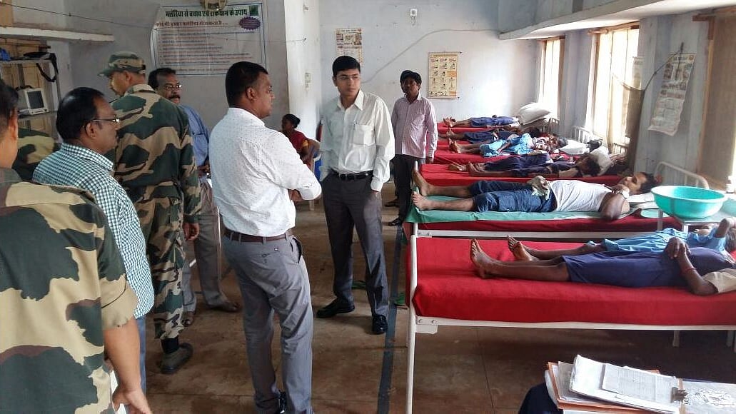 BSF personnel evacuate 98 children from Odisha schools, who suffered food poisoning.