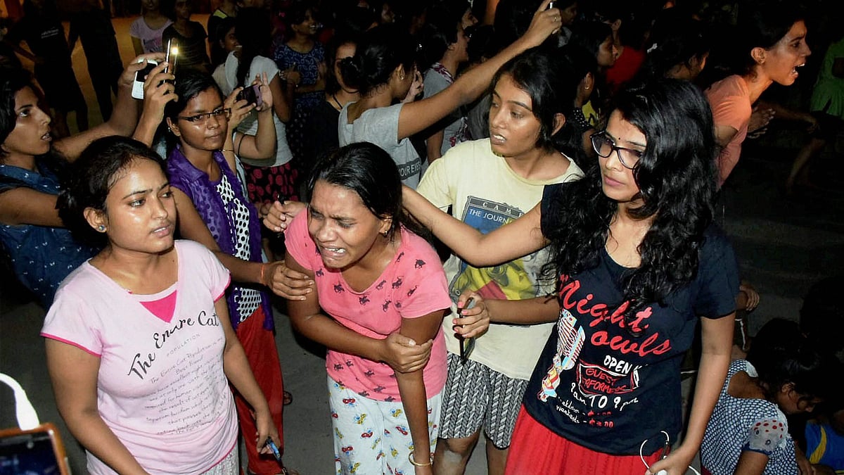 An injured student writhing in pain after police allegedly beat them up during a clash at Banaras Hindu University late Saturday night. &nbsp;