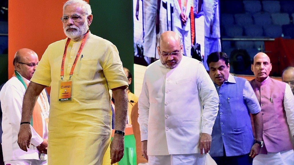  Prime Minister Narendra Modi with BJP President Amit Shah and Union Ministers Niti Gadkari and Rajnath Singh at BJPs national executive meeting at Talkatora stadium, in New Delhi on Monday.