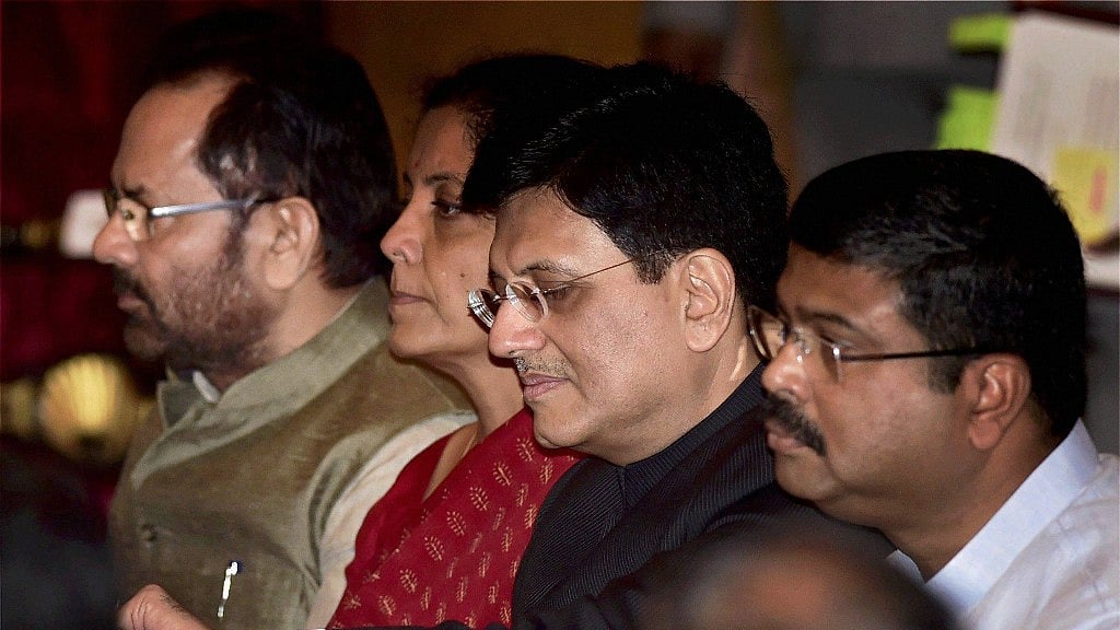 Cabinet Minister Piyush Goyal with cabinet colleagues Nirmala Sitharaman, Mukhtar Abbas Naqvi and Dharmendra Pradhan for the swearing in ceremony at Rashtrapati Bhavan in New Delhi on Sunday.