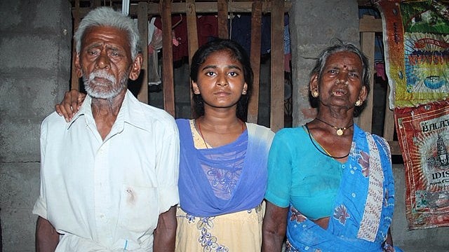 Anitha and her grandparents. 