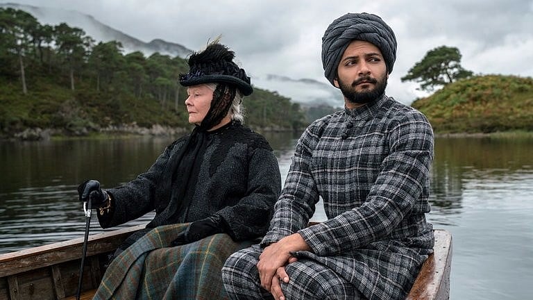 Judi Dench and Ali Fazal in a scene from <i>Victoria & Abdul.</i>