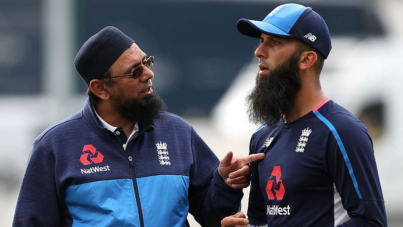 Saqlain Mushtaq with English cricketer Moeen Ali. 