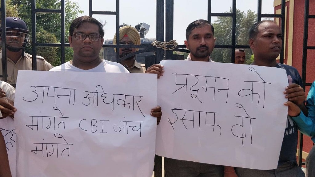 Parents and alumni protest outside Ryan International School.