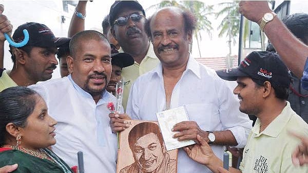 A file photo of Rajinikanth meeting his fans in Chennai.