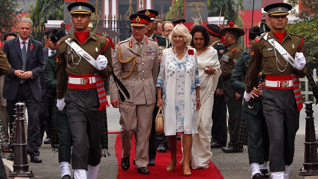

Britain’s Prince Charles (centre, L) and his wife Camilla, Duchess of Cornwall, at the Indian Military Academy in Dehradun during their nine-day long visit to India in 7 November  2013